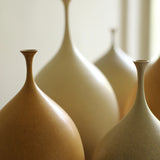 Sophie Cook 'Medium pod eggshell rust'