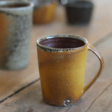 Jack Doherty 'Soda Fired Ochre Tall Coffee Mug'