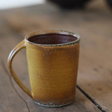 Jack Doherty 'Soda Fired Ochre Tall Coffee Mug'