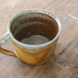 Jack Doherty 'Soda Fired Shallow Ochre Coffee Mug'