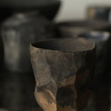 Glenn Dane 'Cup with carved facets from sustainably sourced cedar, with iron oxide finish'