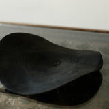 Glenn Dane 'Warped disc from sustainably sourced oak, with iron oxide finish and stitch mending'