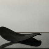 Glenn Dane 'Warped disc from sustainably sourced oak, with iron oxide finish and stitch mending'