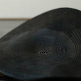 Glenn Dane 'Warped disc from sustainably sourced oak, with iron oxide finish and stitch mending'