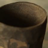 Glenn Dane 'Cup with carved facets from sustainably sourced cedar, with iron oxide finish'