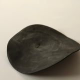 Glenn Dane 'Warped disc from sustainably sourced oak, with iron oxide finish and stitch mending'