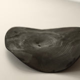 Glenn Dane 'Warped disc from sustainably sourced oak, with iron oxide finish and stitch mending'